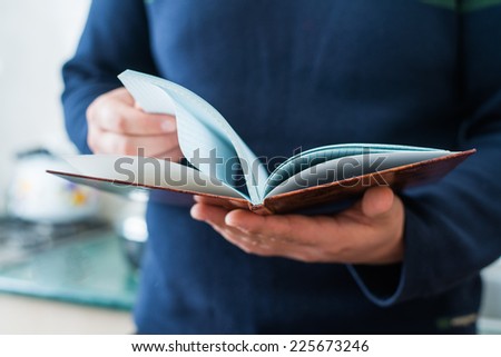 Man reads magazine