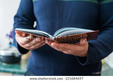 Man reads magazine