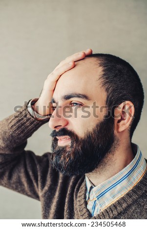 man looking forward to the future against a green background