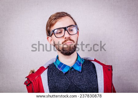 closeup of  young man with shirt and glasses
