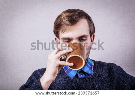 Men drinking coffee. Close-up of men drinking coffee outdoors