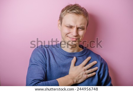 A young man suffering from heart pain
