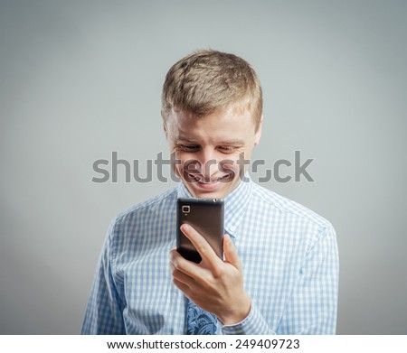 Young man speak by mobile/ happy