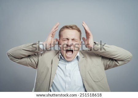 Closeup portrait of angry, frustrated man. Negative human emotions and facial expressions