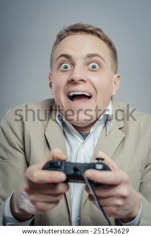 Emotional office clerk games with joystick on a gray background