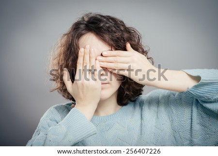 I cant see you - Young Women is covering her eyes with her hands