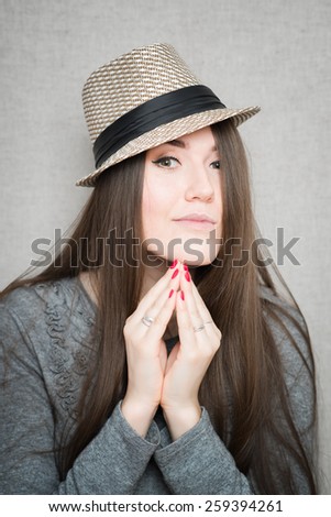 Portrait of a Beautiful Young Woman in hat. Retro Style.