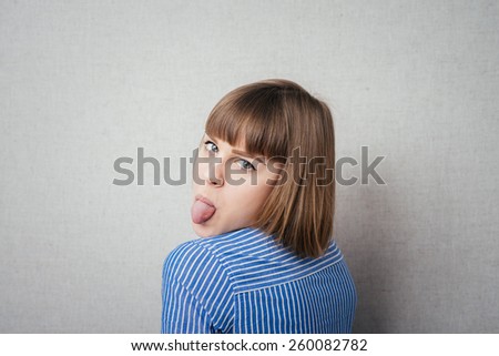 Girl sticking her tongue out