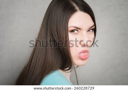 Girl sticking her tongue out
