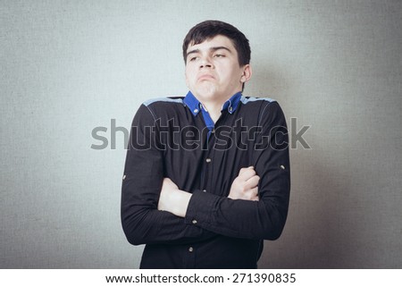 man offended shows that he knows nothing crossed his arms crosswise