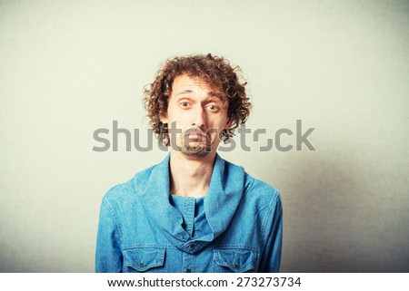 Portrait of a sad young man