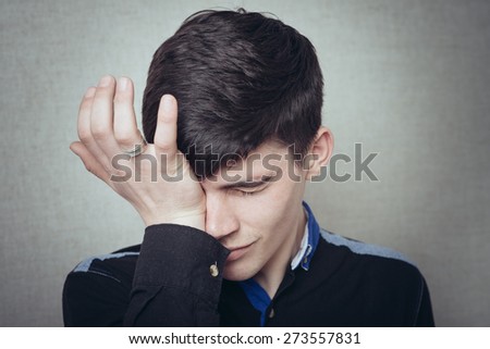 young man crying