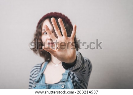 young beautiful woman excited with greeting hello