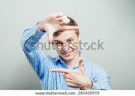 man making frame hand