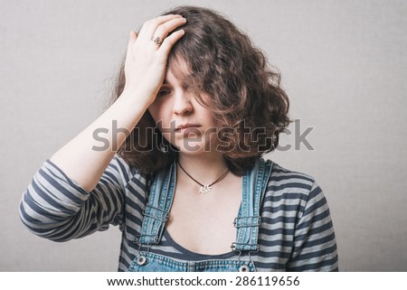 Headache.  woman having a headache