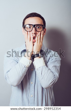 guy with glasses in shock