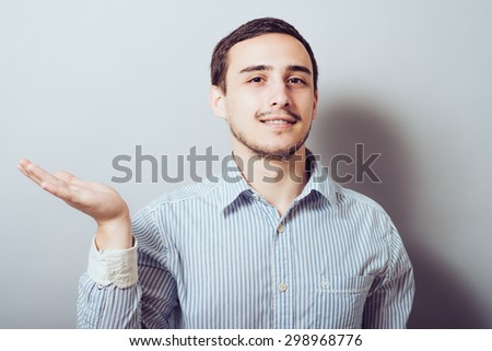 Man holding something on his palm