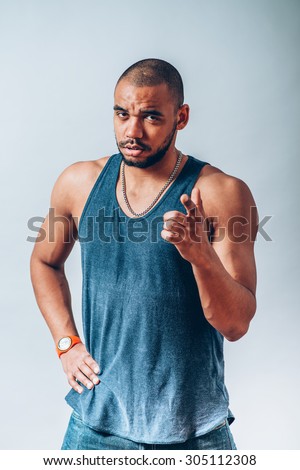 Portrait of an angry man making angry gesture