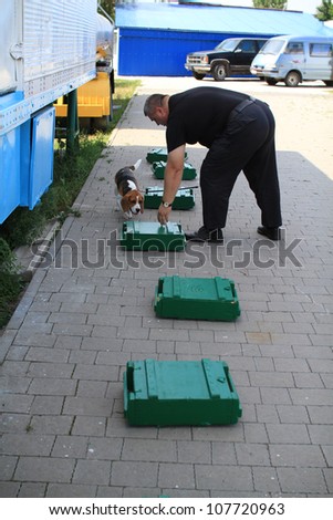 KHMELNITSKY, UKRAINE - JULY 12: Dog handlers are trained in the customs dogs to look for drugs and weapons, July 12, 2012 in Khmelnitsky, Ukraine