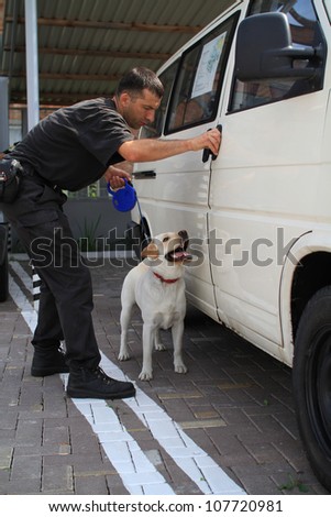 KHMELNITSKY, UKRAINE - JULY 12: Dog handlers are trained in the customs dogs to look for drugs and weapons, July 12, 2012 in Khmelnitsky, Ukraine
