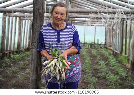 Woman farmer with white radish