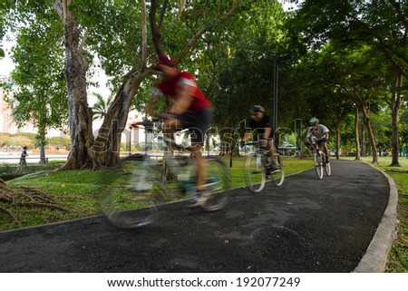 Motion blurred a group of biker in the park