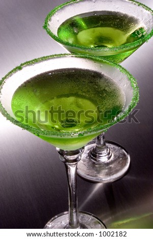 stock-photo-two-green-apple-martini-s-with-green-colored-sugar-around-the-rims-chilled-to-perfection-on-a-1002182.jpg