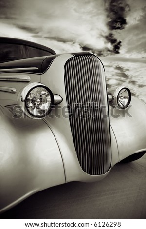  Front grill and headlight view of a restored 1936 chevy classic car done