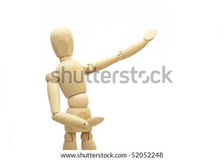 wooden puppet saying hello and inviting / pointing