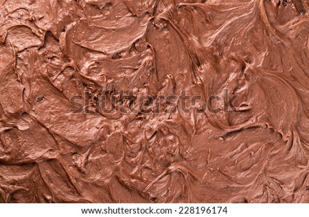 Chocolate cake frosting close up