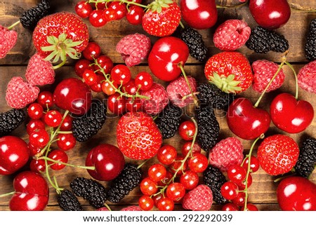 Collection of cherries, strawberries, mulberries, red currants, raspberries for background