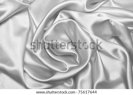 close up of silver silk textured cloth background