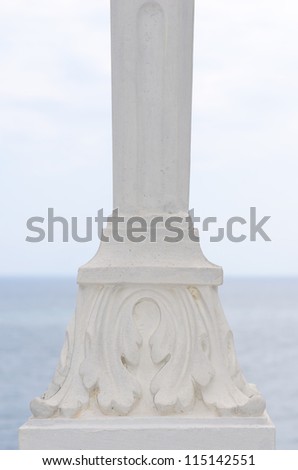 seascape visible through old columns