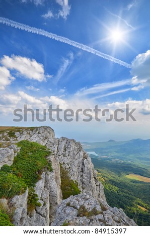 top of the mountain on the background of the cloudy sky. natural composition