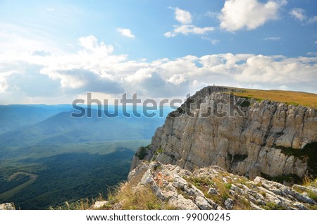 top of the mountain on the background of the cloudy sky. natural composition