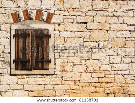 Window in the old stone wall