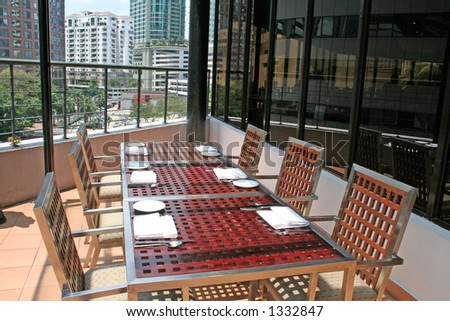 Penthouse outdoor dining, city view