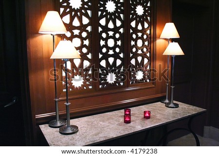 Foyer table with lamps and candles