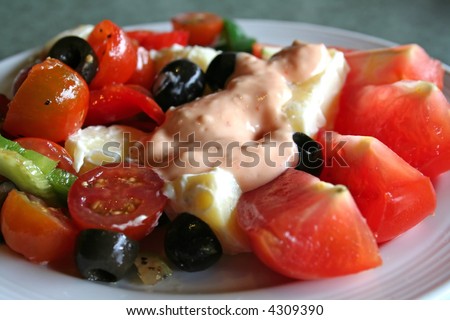 Fresh mixed vegetable salad with tomatoes and potatoes