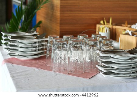 Service area in a restaurant with glasses and plates