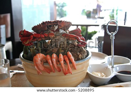 Seafood on ice served in a restaurant with prawns crabs and shellfish