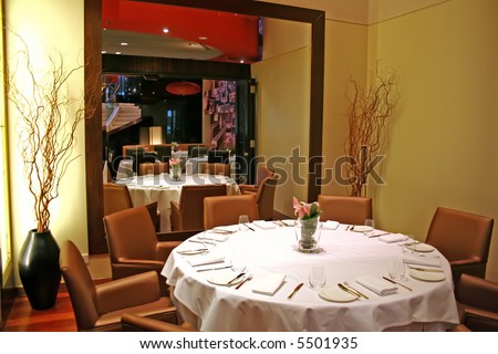 Elegant restaurant dining table setting with cutlery