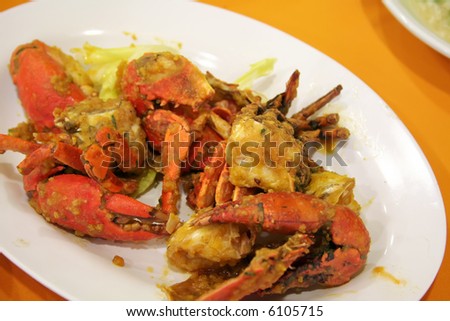 Salted egg fried crabs traditional asian cuisine restaurant setting