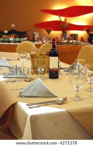 Interior of a luxury comtemporary restaurant table and setting