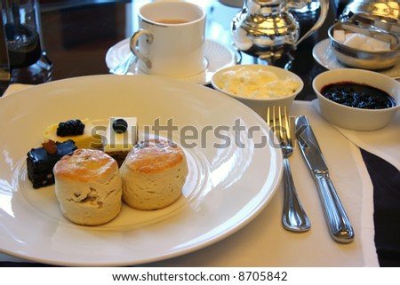 Classic british afternoon tea with scones and cakes