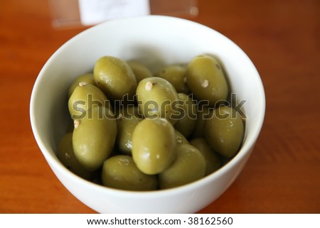 Marinaded fancy green olive snack appetizer dish