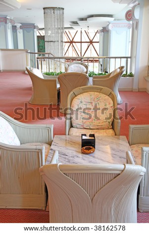 Elegant casual wicker furniture in sunny room