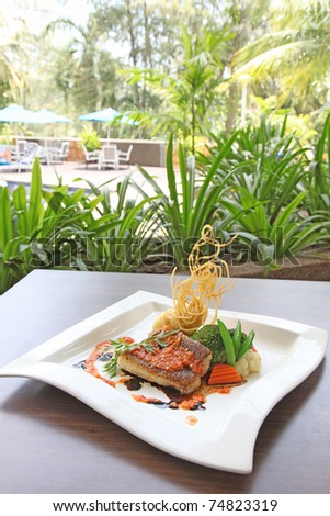 Grilled seabass fillet seafood fish dish elegant presentation