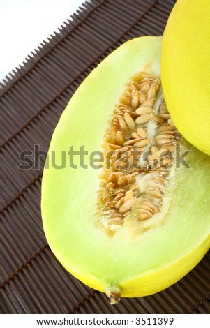 Canary melon isolated on white -yellow melon