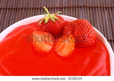 strawberry jelly with mint leaf as garnish